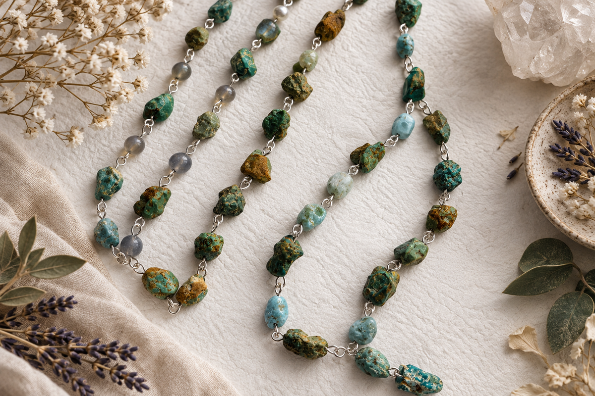 Raw turquoise nugget bead chains arranged in a serene flat lay — natural green and blue-green turquoise stones with a healing, meditative quality